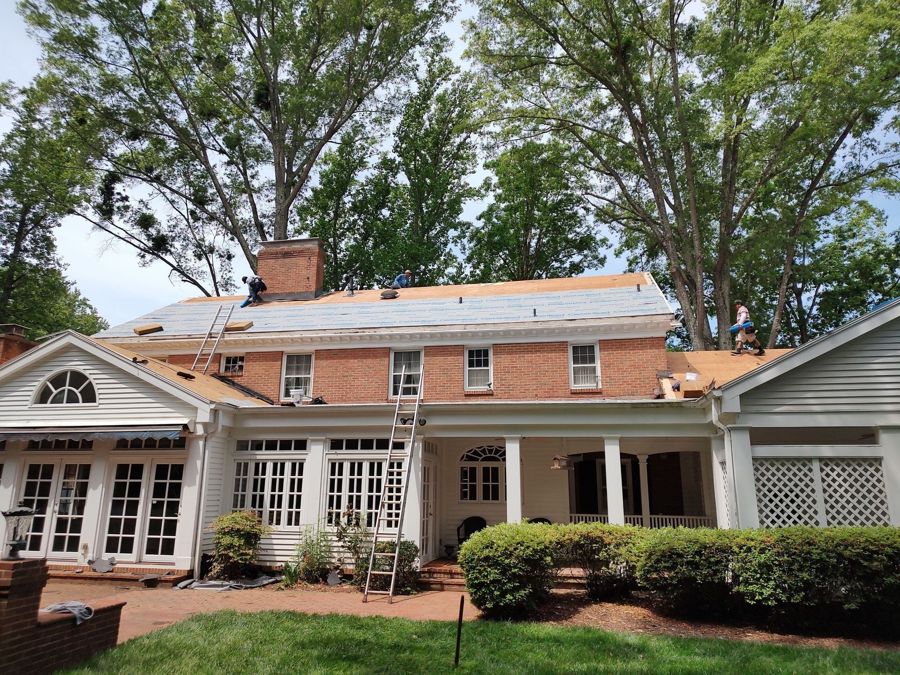 Beautiful home with architectural shingle roof by S&S Roofing